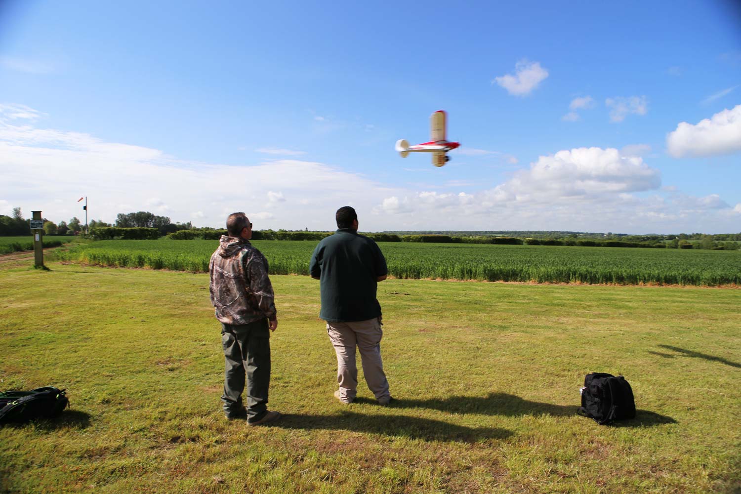 Customers flying a model aircraft around Pete’s Airgun Farm in Essex
