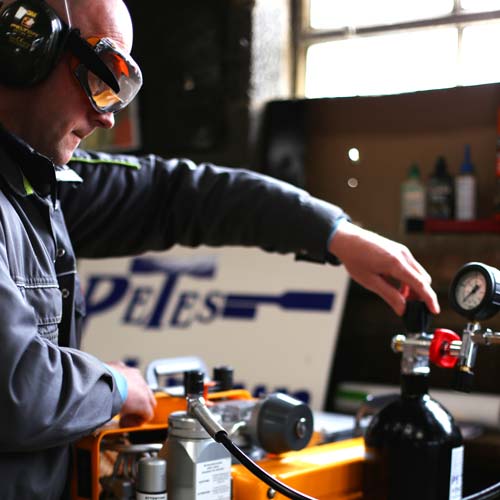 Pete re-charging a CO2 cylinder at the farm